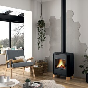Invicta Carolo Zen Cast Iron Wood Stove with flue pipe chimney in a room setting
