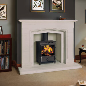 FDC Eco 5 wide multifuel stove photo in room setting with langford veined stone fireplace surround