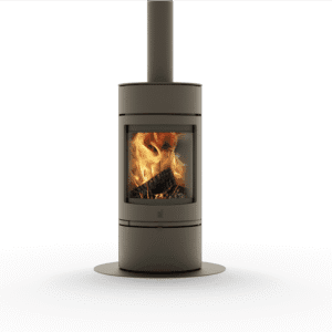 Orbe K53440 wood stove with a visible flame and logs inside the firebox.
