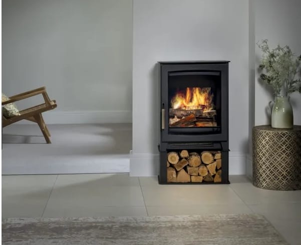 Black Parkray Aspect 5 Pure Flame Electric Stove with realistic flame effect and log storage base, adding warmth to a modern room.